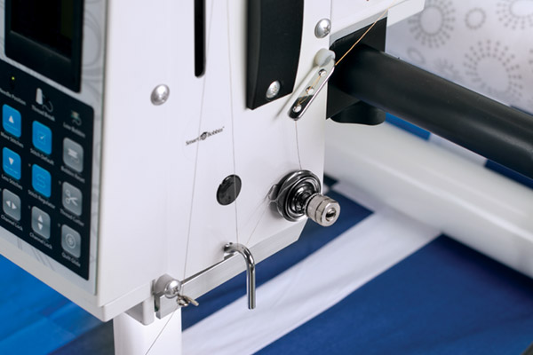 Simple DIsc Tensioner on side of quilting machine