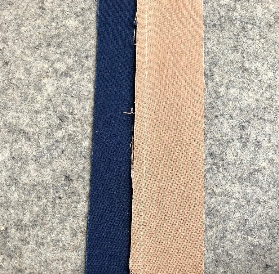 When practicing faux binding press the seam toward the binding fabric.