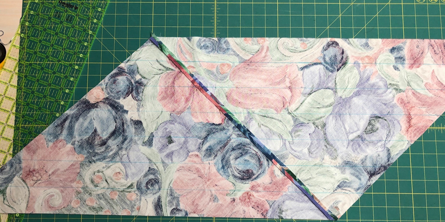 Marked parallelogram on floral fabric