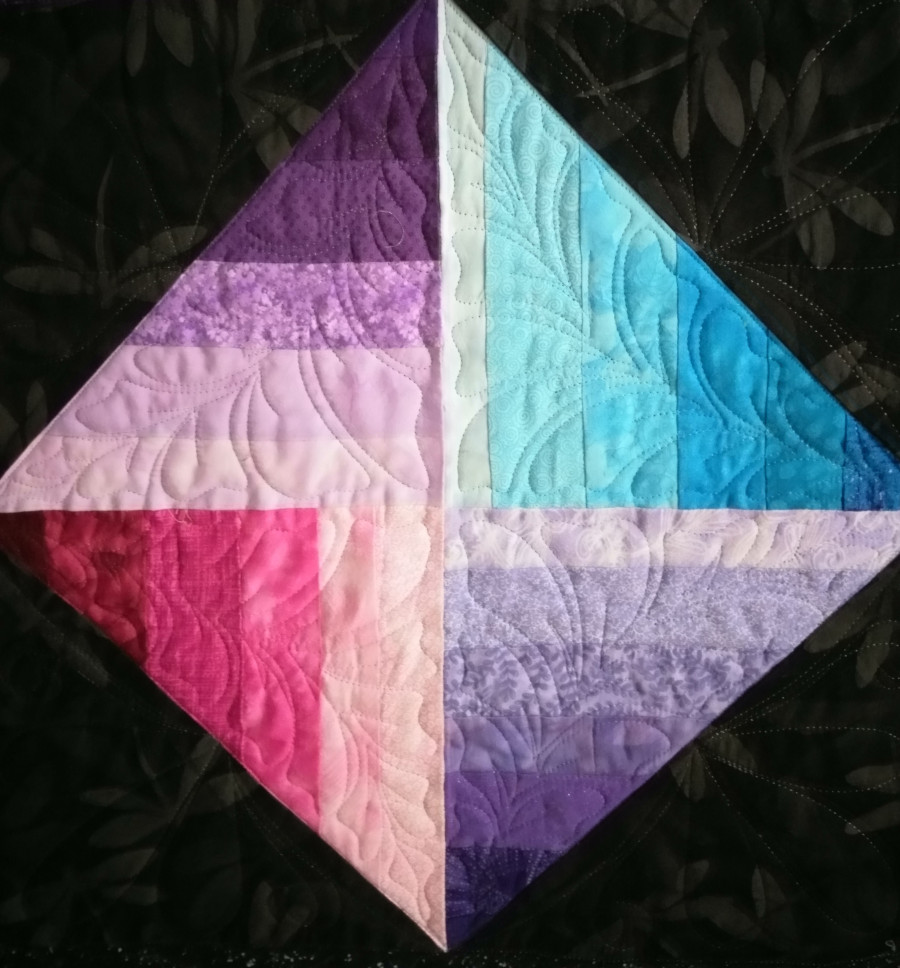 Achieving color illusion in longarm quilting – Part 2: Luster - Luster quilt zoomed in image