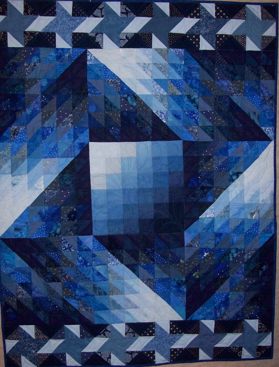 Achieving color illusion in longarm quilting – Part 2: Luster - spinning stars quilt