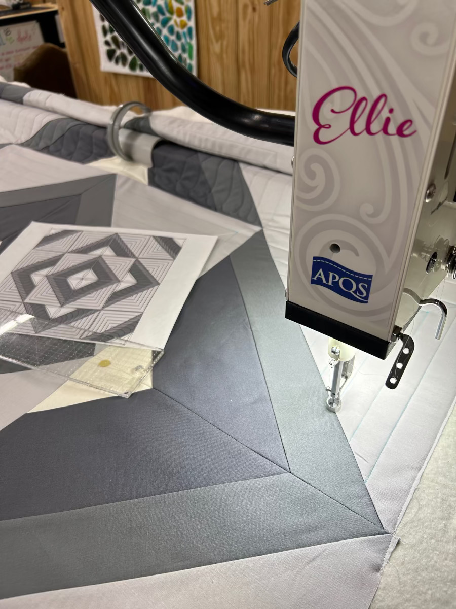 Quick Quilt Top -Half Triangle Square Block – Win our finished quilt - quilting the quilt on Ellie
