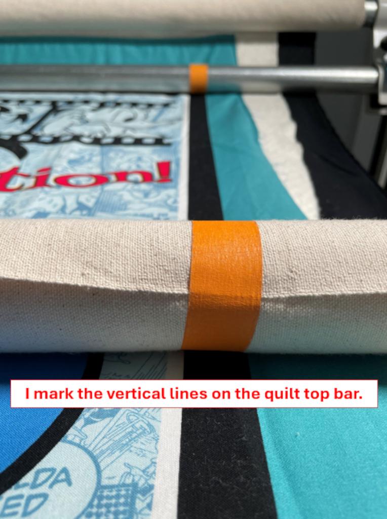 Keeping your quilt square - demonstrating how to mark the quilt top bar